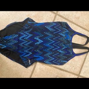 Dolfin swim suit fits women’s xsmall